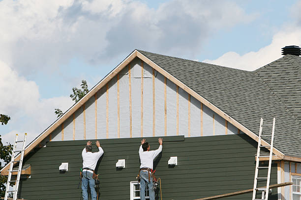 Professional Emergency Siding Repair technician working in Cedarville, OH